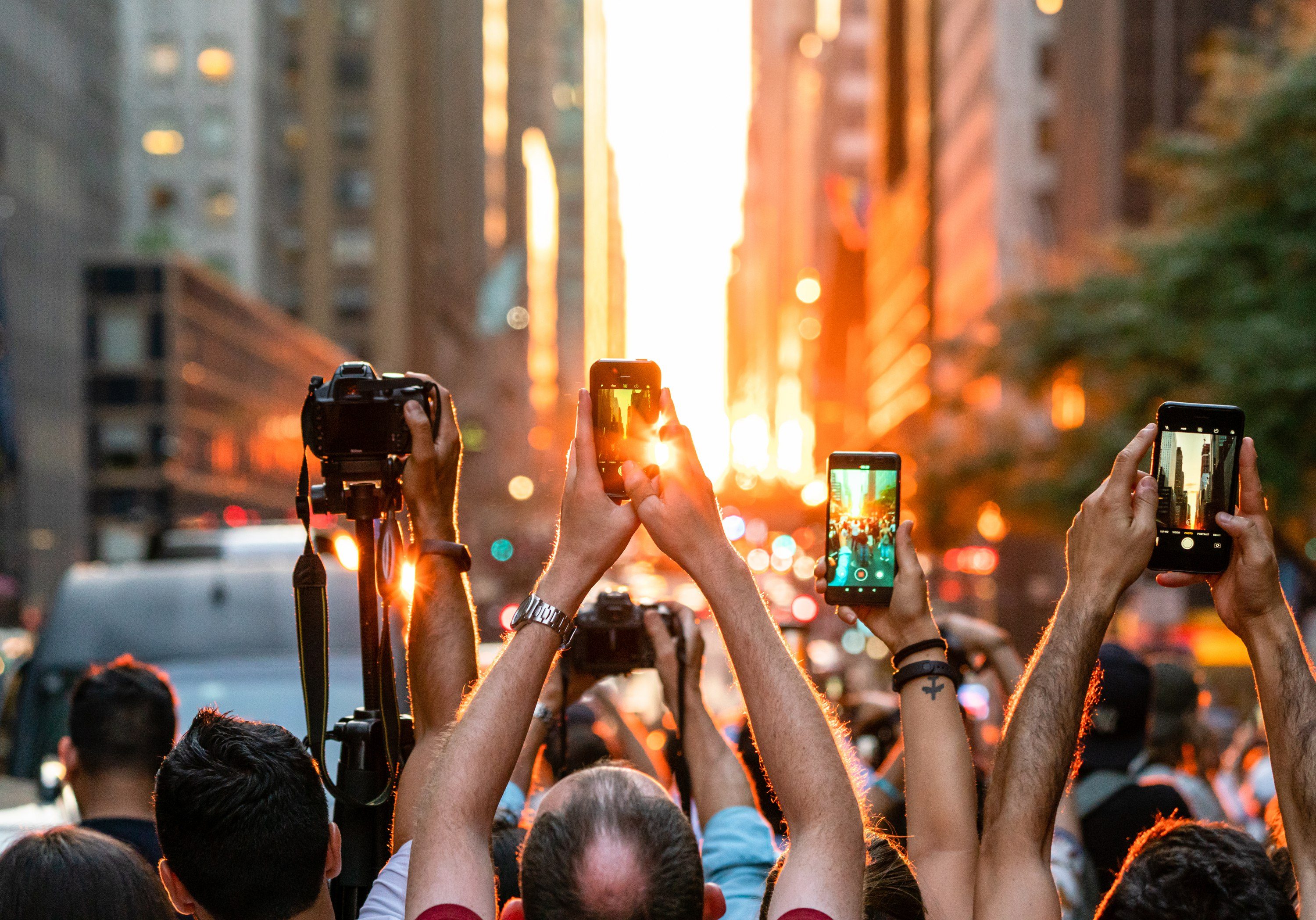 Manhattanhenge is a unique urban event where the setting sun aligns directly with the east-west grid of Manhattan. — New York City