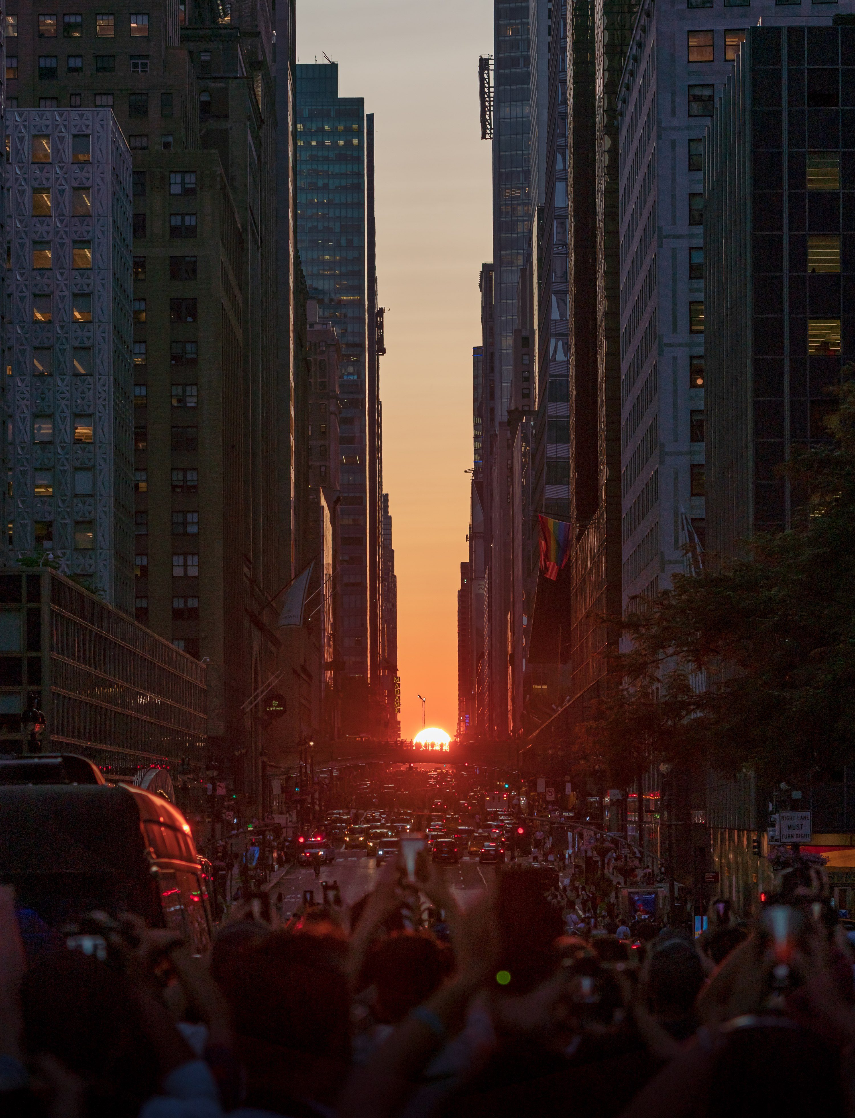 Manhattanhenge is a unique urban event where the setting sun aligns directly with the east-west grid of Manhattan. — New York City